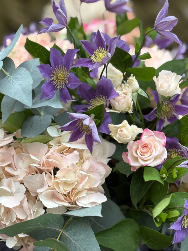 Pink Hydrangea and lilac Clematis.