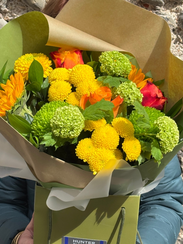 Seasonal yellow orange and lime green gift bag.