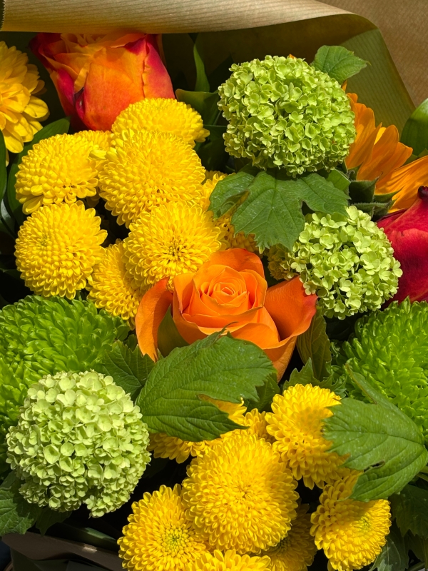 Seasonal yellow orange and lime green gift bag.