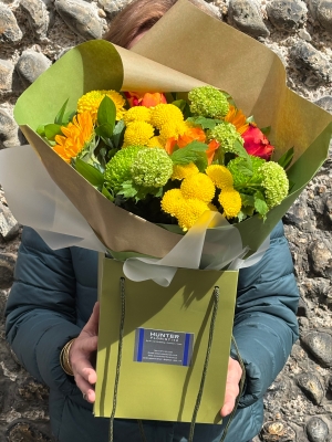 Seasonal yellow orange and lime green gift bag.