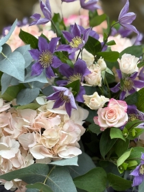 Pink Hydrangea and lilac Clematis.