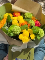 Seasonal yellow orange and lime green gift bag.